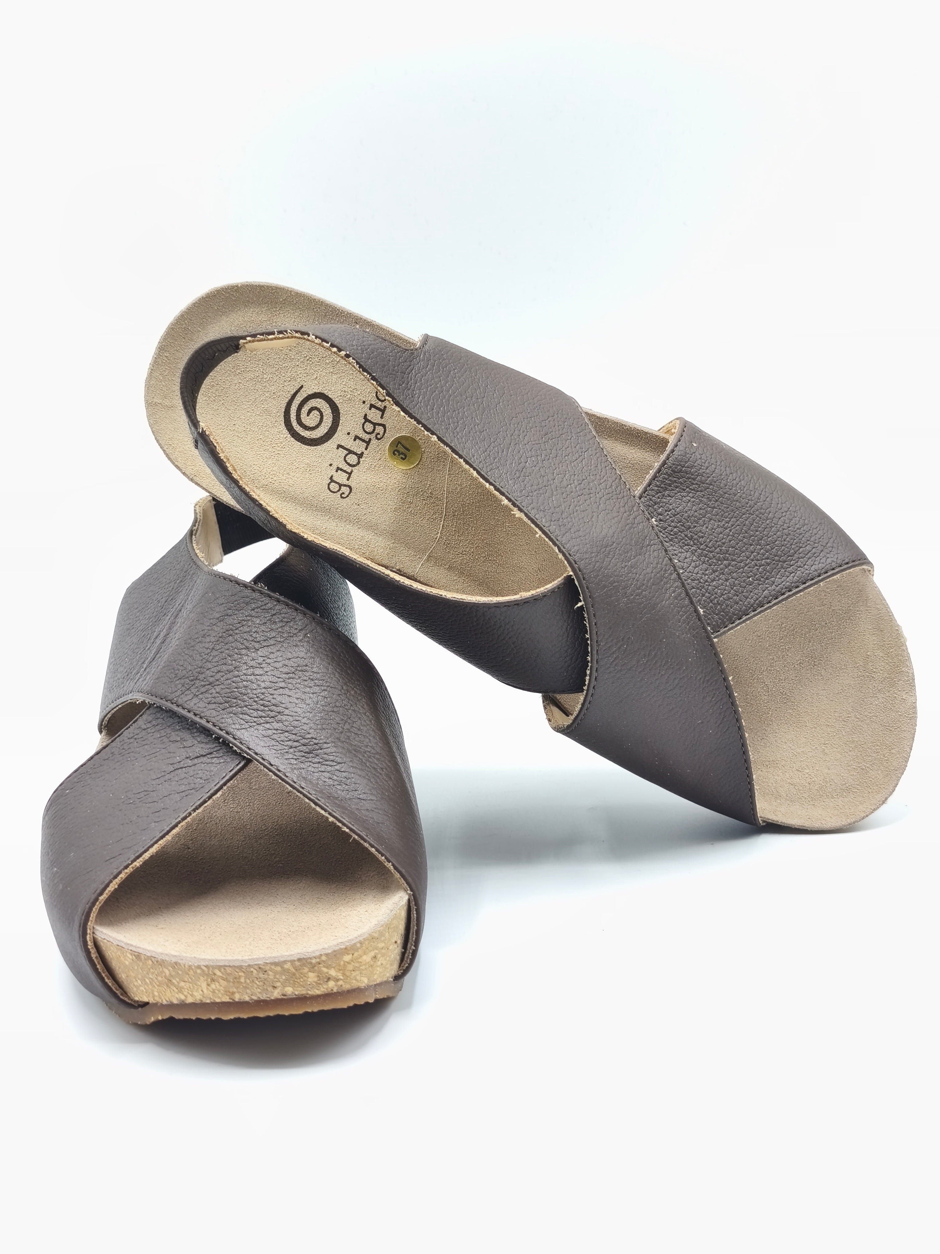 Sandali con zeppa in pelle